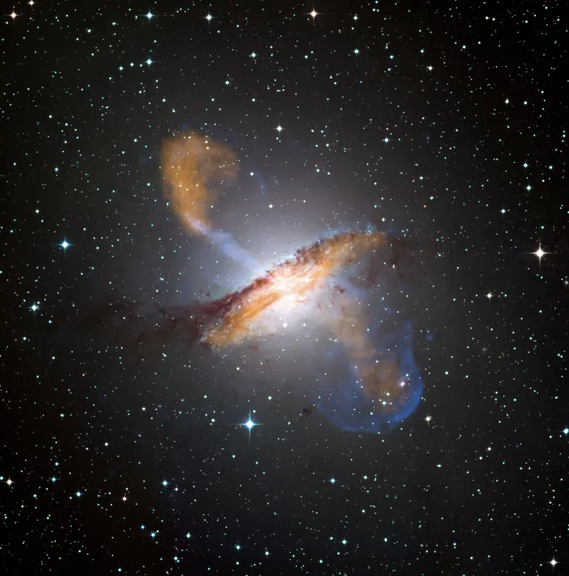 Image by ESO/WFI (Optical); MPIfR/ESO/APEX/A.Weiss et al. (Submillimetre); NASA/CXC/CfA/R.Kraft et al. (X-ray)
Derivative work including grading and crop: Julian Herzog — CC BY 4.0
